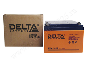 Открытая коробка и аккумулятор Delta DTM 1226 рядом
